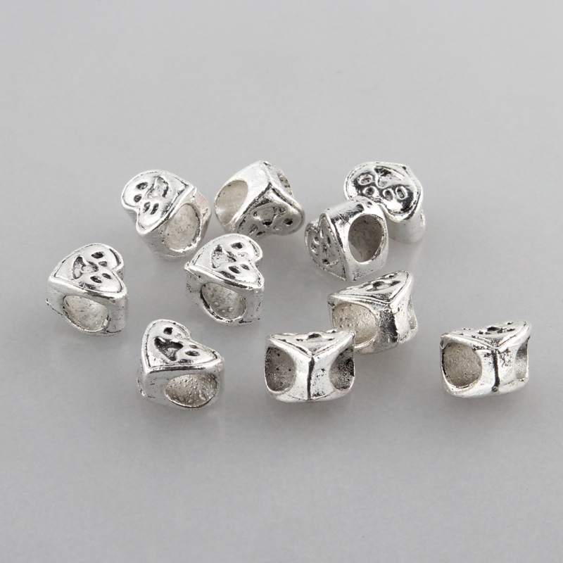 Kovové korálky Labka 9.5x10x7mm, 4 ks