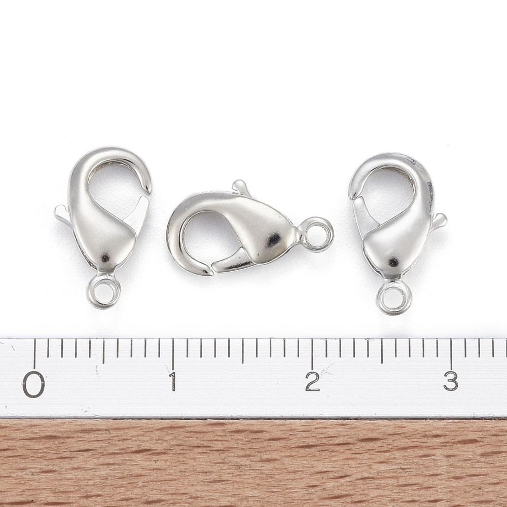 Zapínanie delfín bez kadmia, niklu a olova 12x7x3mm, 10 ks